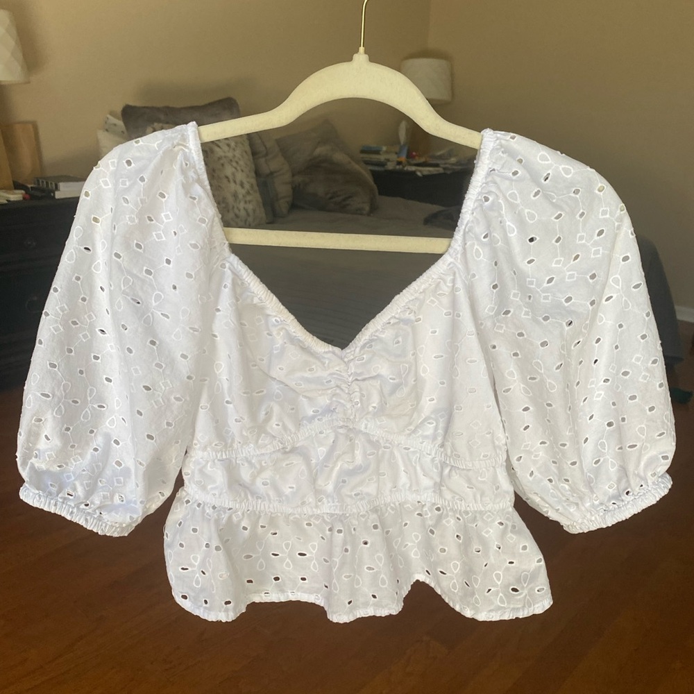 Cropped white eyelet blouse